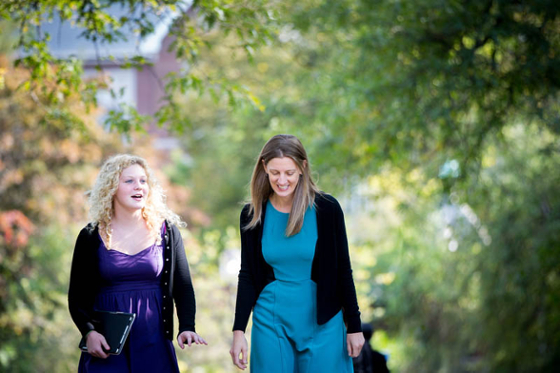 Photo of two female Chatham University faculty members walking on Shadyside Campus
