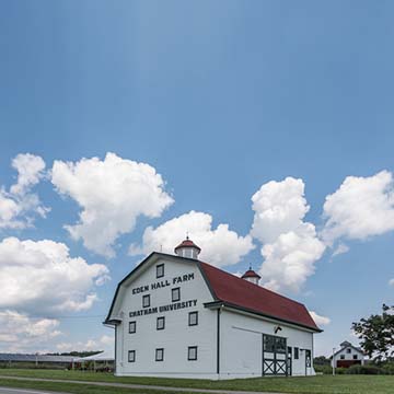 Photo of a white barn on Chatham University's Eden Hall Campus