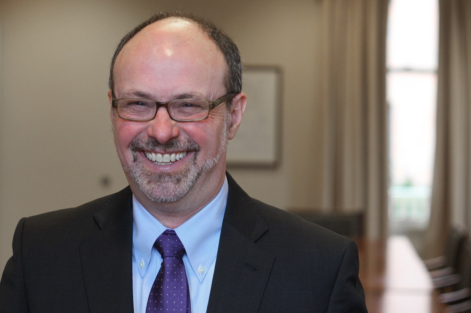 Photo of Chatham University President David Finegold smiling.