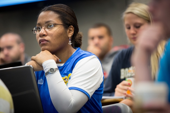 Photo of a Chatham University student paying attention to a lecture