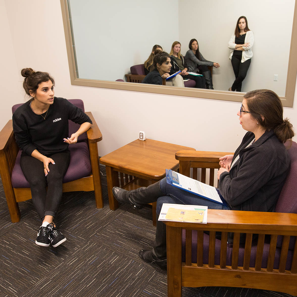 Two counseling psychology graduate students working together