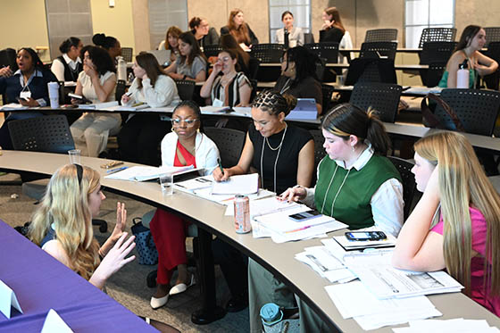 Chatham students working together in a lecture hall