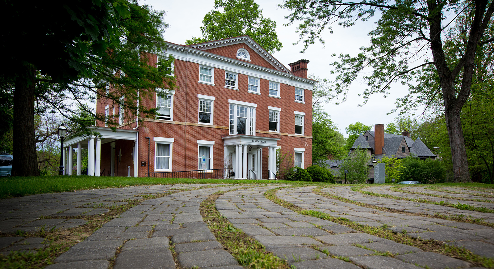 Photo of red brick Berry Hall on Chatham University's Shadyside Campus