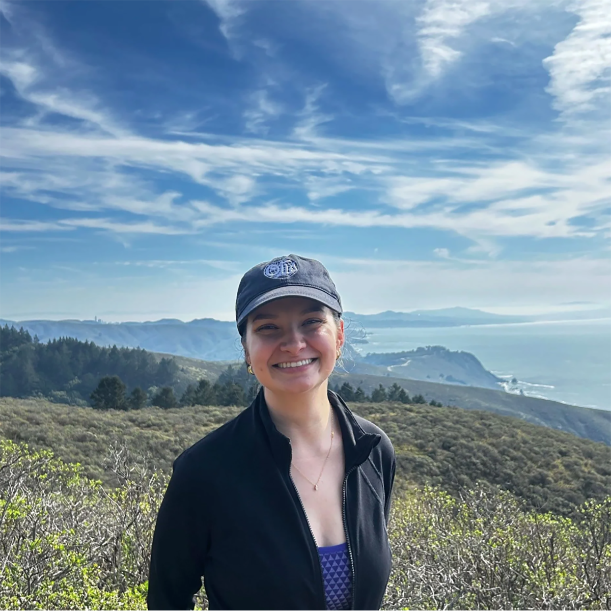 Gina Cowser poses for a photo in the hills of Berkeley, CA