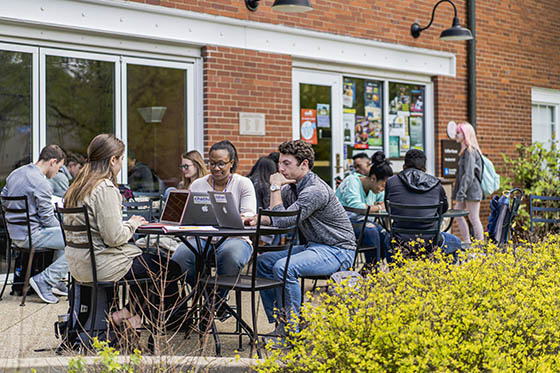 Chatham students sitting outside on Shadyside Campus at Cafe Rachel