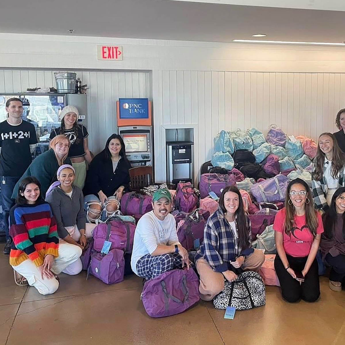 Members of the Foster Love Project pose for their 2023 bag drive