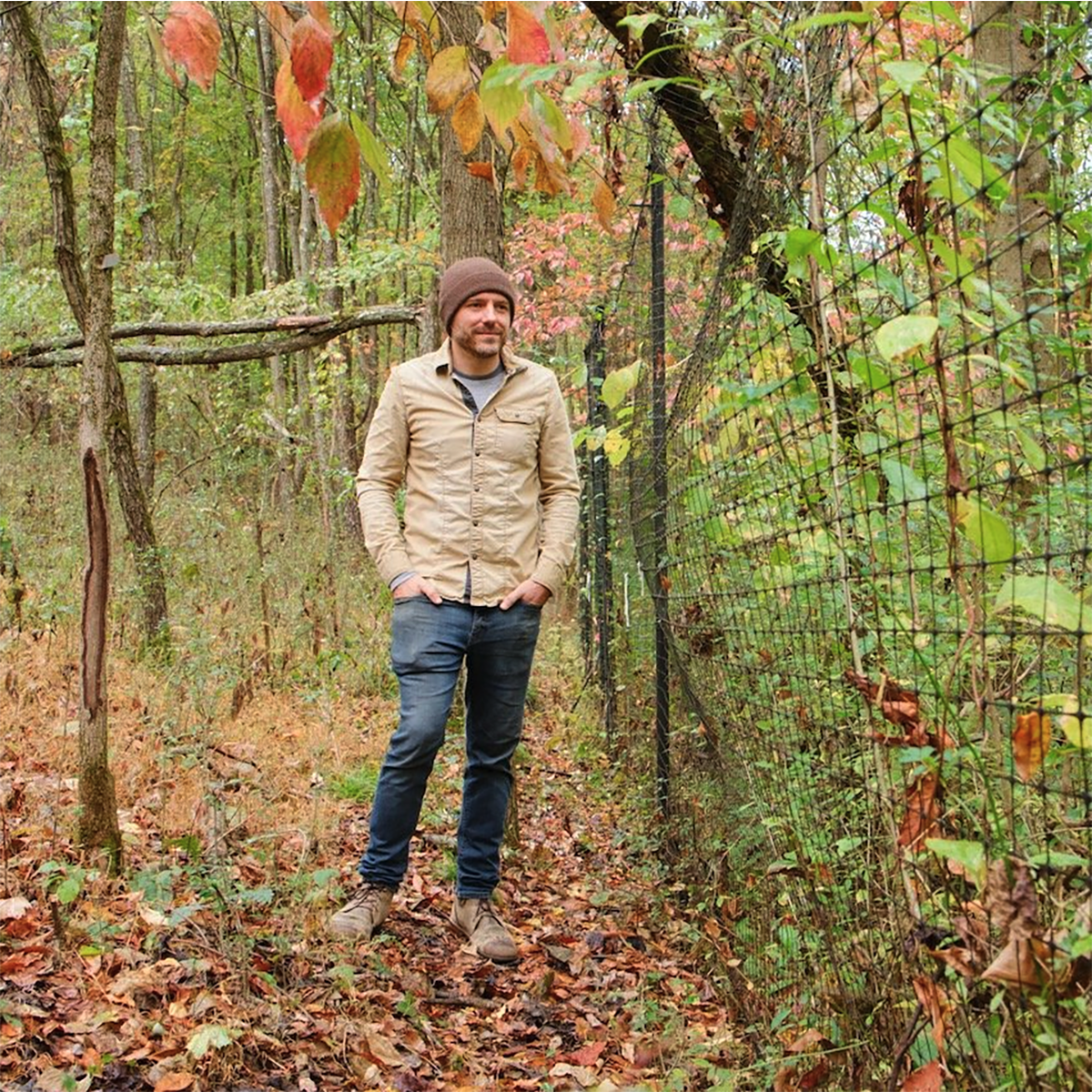 Photo of a Chatham sustainability faculty member in the woods