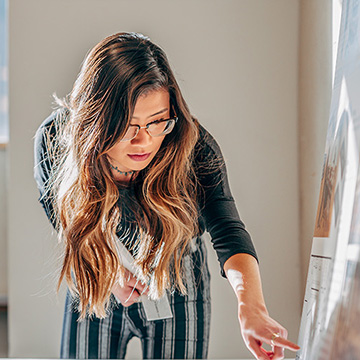 Chatham Master of Interior Architecture student presents to faculty