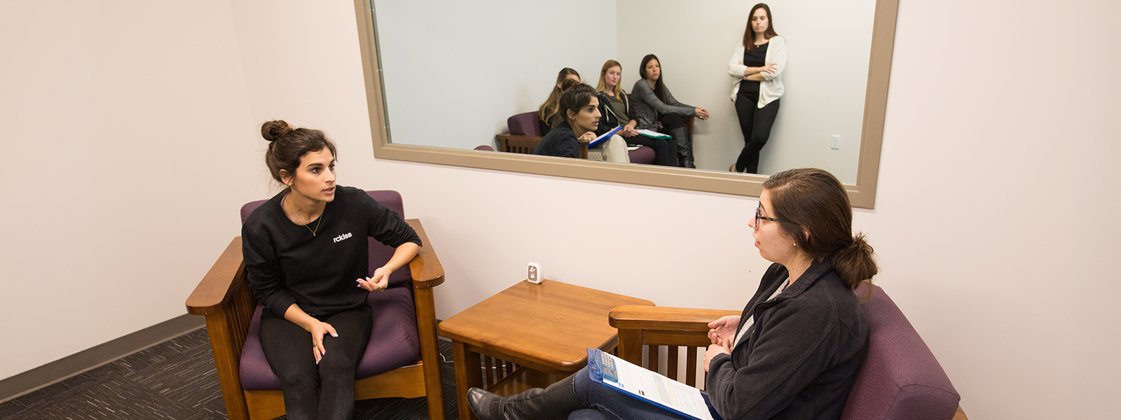 Two counseling psychology graduate students working together
