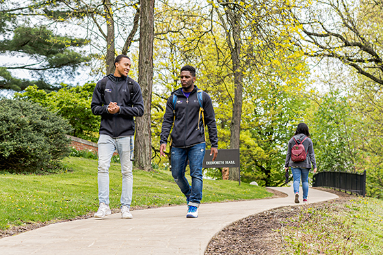 Photos of three Chatham students walking on a campus path